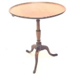 A 19thC mahogany occasional table, the circular dished tilt top on a turned vase shaped column and a