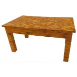 An unusual coffee table, of parquetry form, the rectangular top made from various specimen