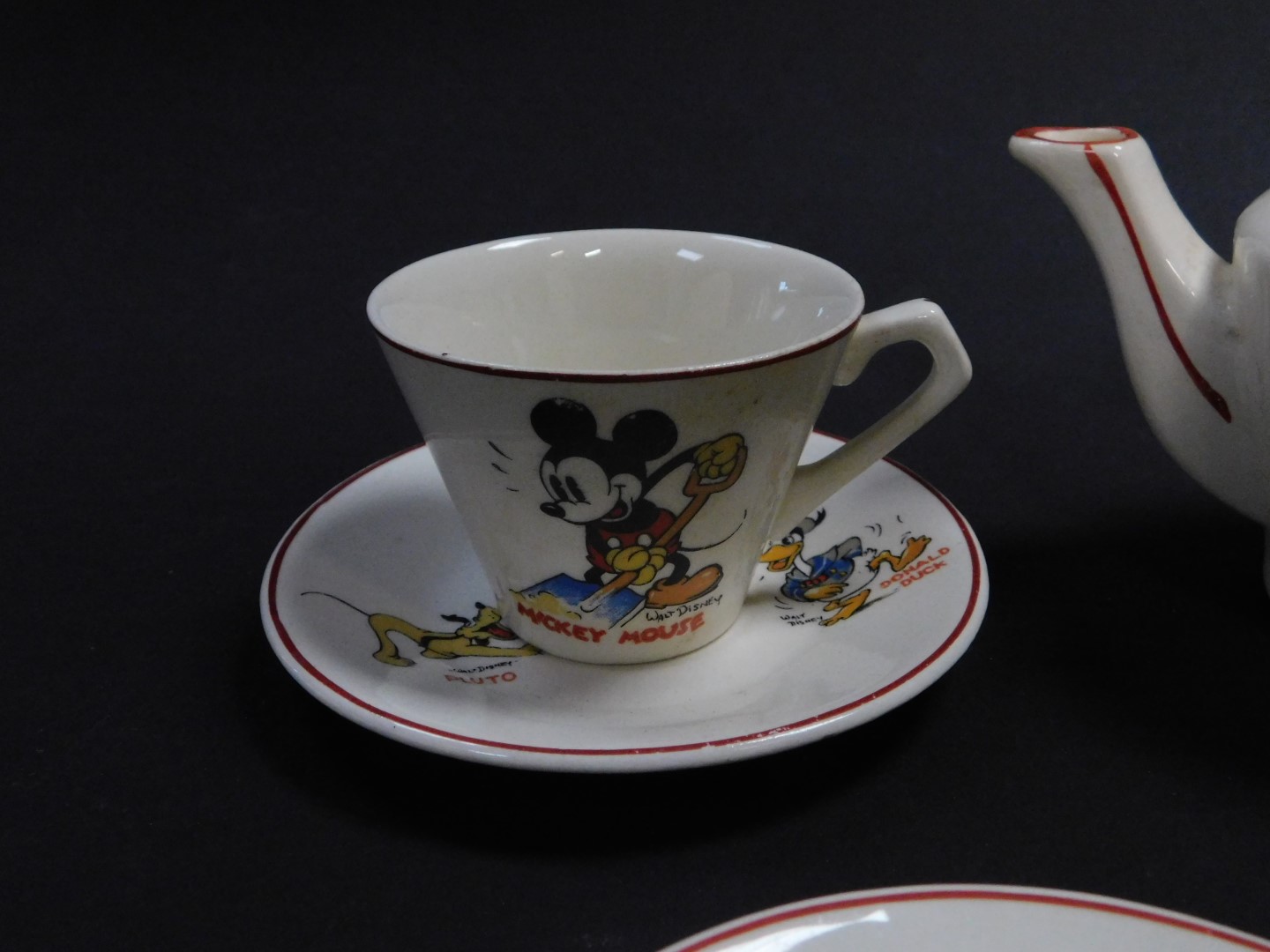 An early 20thC Wade Heath for Walt Disney pottery child's part tea set, decorated with Donald - Image 2 of 3