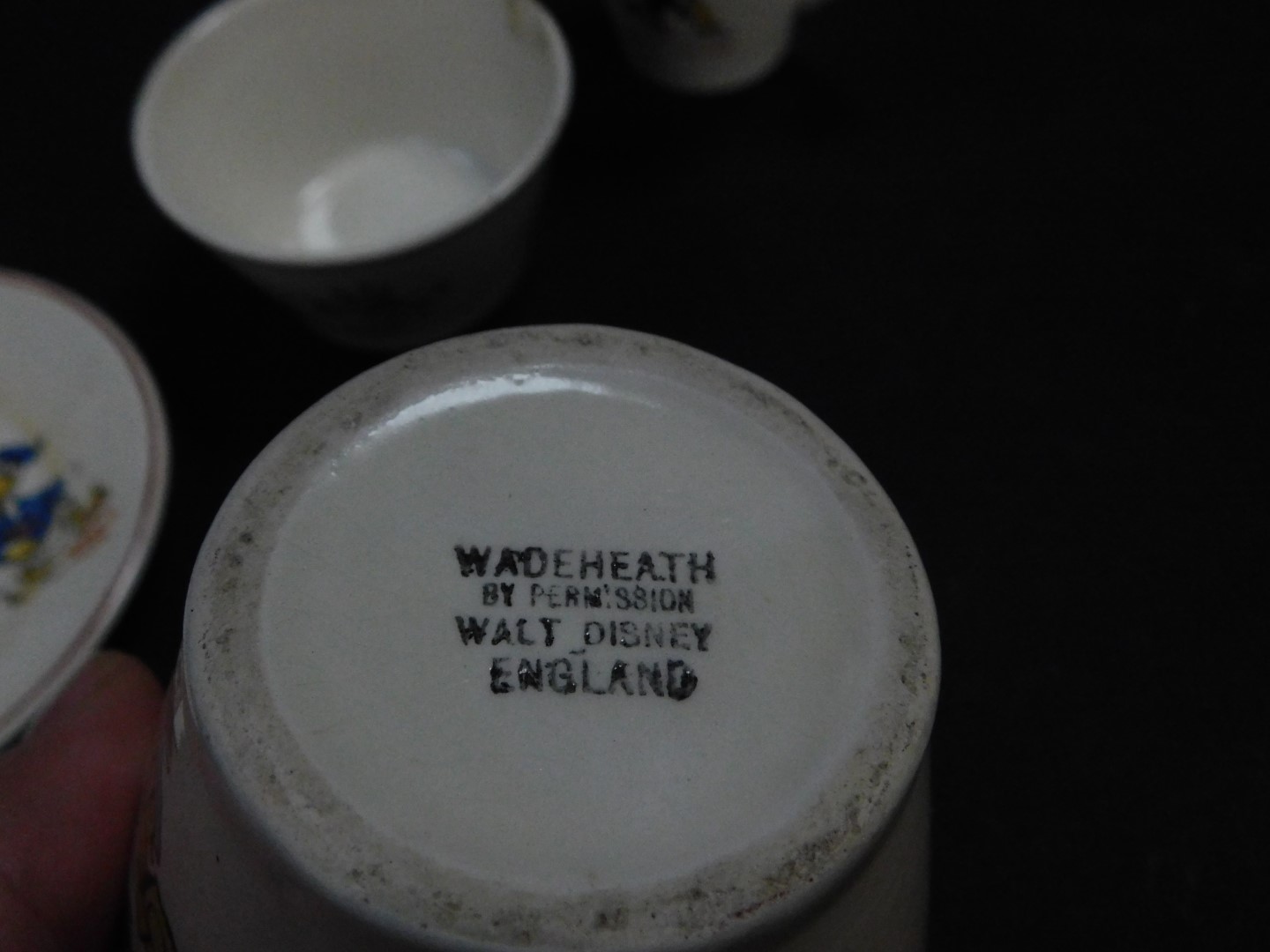 An early 20thC Wade Heath for Walt Disney pottery child's part tea set, decorated with Donald - Image 3 of 3