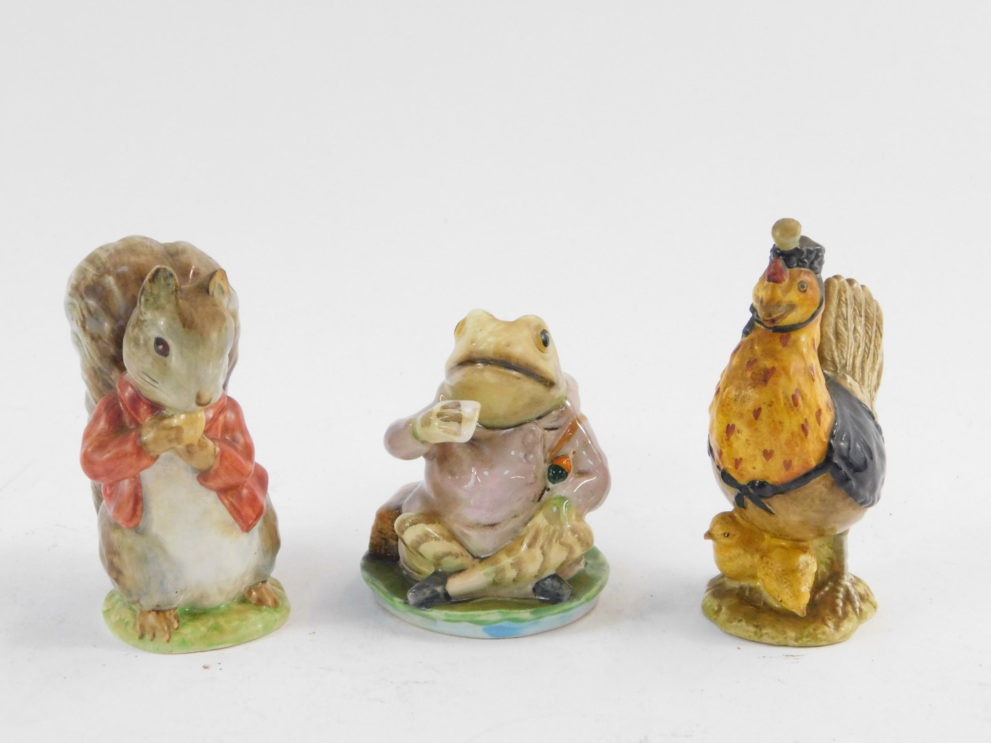 A Beswick Beatrix Potter figure modelled as Timmy Tiptoes, F Warne & Company Ltd gold mark, together