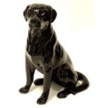 A large Beswick model of a seated black Labrador, No.2314, 35cm H.