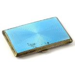 A continental silver and guilloche enamel cigarette case, the blue enamel top decorated with a