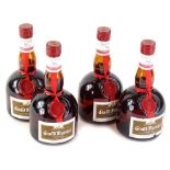 Four bottles of Grand Marnier.