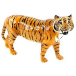 A Beswick pottery model of a standing tiger, 30cm L.