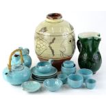 A Studio pottery vase with sgraffito decoration of fish, a Studio part tea set and a green glazed