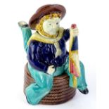 A Majolica Isle of Man teapot and cover, possibly William Brownfield and Son, modelled in the form