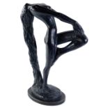 An Austin products bronzed resin statue of a female nude, on oval ebonised wooden base, 54cm H.