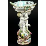 A Meissen porcelain centrepiece, the basket shaped bowl with pierced sides and handles, on a