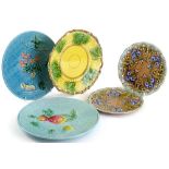 A collection of Majolica desert dishes, to include one decorated with fruit on a turquoise ground,