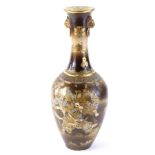 A late 19th/early 20thC Japanese earthenware two handled bottle chip vase, decorated in raised