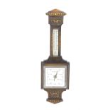 An early 20thC oak cased barometer, with a square dial, and thermometer, the case with foliate