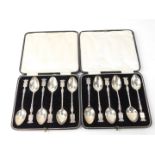 Two sets of French coffee spoons, each engraved with a town in Northern France, with shield and