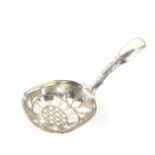 A George III silver caddy spoon, with a pierced foliate engraved and shaped bowl, Joseph Taylor