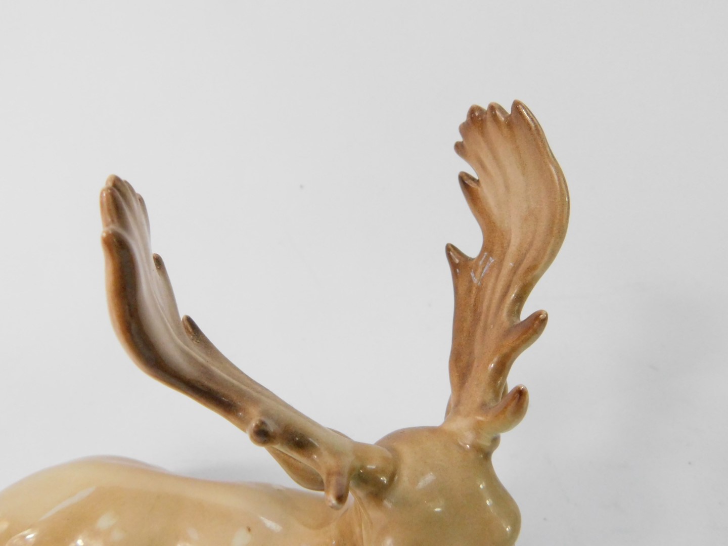 A Beswick figure of a stag deer, modelled in recumbent pose, No 954, printed and impressed marks. - Image 2 of 4