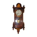 A Victorian beech cased wall clock, circular enamel dial bearing Roman numerals, named for E Pearce,
