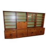 A G-Plan 1960's four section lounge unit, comprising a pair of bookcases, each with four shelves