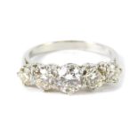 An 18ct gold and diamond five stone ring, approx 2.04ct, size P, 5.3g.