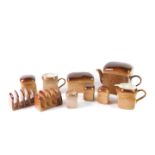 A Carltonware pottery part breakfast set, decorated in the Hovis Bread shape, comprising teapot,
