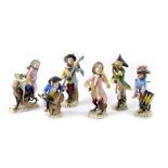 A set of six Volkstedt 20thC porcelain monkey band figures, comprising conductor, French horn,