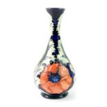 A Moorcroft pottery vase by Rachel Bishop, decorated in the Poppy pattern, of baluster form c1996,