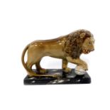 A Ralph Wood Staffordshire late 18thC pottery figure of The Medici Lion, modelled standing with