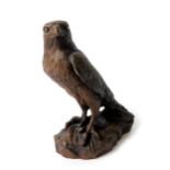 A North Light bronze sculpture 1979, modelled as a falcon, raised on a naturalistic base, 16cm H.