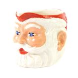 A 1950's pottery character jug modelled as Father Christmas, for Birds Custard, printed and