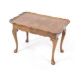 A Georgian style walnut occasional table, with a separate piecrust tray top, on a rectangular