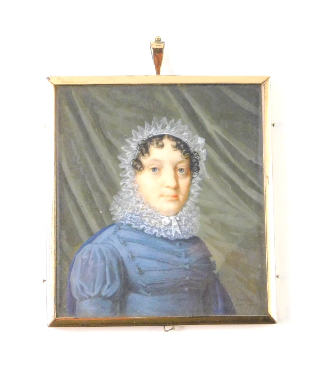 An early 19thC portrait miniature, half length study of a lady in a blue dress with lace collar