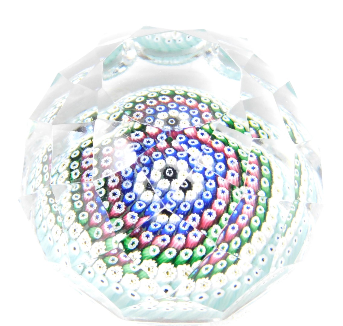 A Whitefriars faceted glass paperweight, with concentric millefiori decoration and dated cane for