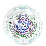A Whitefriars faceted glass paperweight, with concentric millefiori decoration and dated cane for