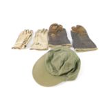 A pair of USAAF WWII flying gauntlets, type A-9, a pair of Vietnam era M1950 cattle hide gloves, and