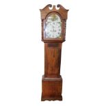 A George III oak longcase clock, the break arch enamel dial painted with floral spandrels,