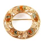 A 9ct gold rose gold and moss agate brooch, of circular form, with five oval cabachons, interspersed