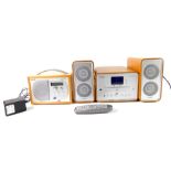 A Pure Evoke -1 Digital Radio, Pure Legato CD player, and a pair of pure speakers, with