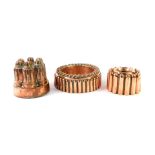Three Victorian copper mousse or jelly moulds, one of Castle form by F L Paulmann, Hanover., 13cm H,
