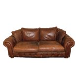 A brown leather two seater sofa, with button upholstered front and arms, two cushion seats and