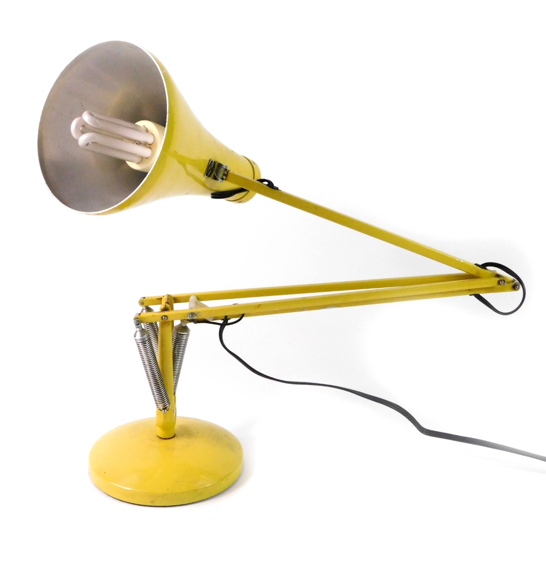 A late 20thC Herbert Terry & Sons Ltd yellow angle poised table lamp.