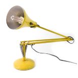A late 20thC Herbert Terry & Sons Ltd yellow angle poised table lamp.