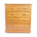 A Victorian mahogany chest of drawers, with two short over three long drawers, raised on a plinth