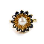 A 9ct gold cultured pearl and sapphire set flower head ring, high claw set, size M, 4.6g.