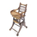 A late Victorian metamorphic child's high chair.