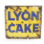 An enamel advertising sign for Lyons Cakes, blue lettering against a yellow ground, 76cm H, 81cm W.