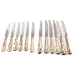 A set of six Garrard silver handled table knives and six dessert knives, boxed, Sheffield 1966.