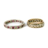 A 9ct white gold ruby and white sapphire full eternity ring, size W, and a further 9ct gold and