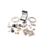 Silver and costume jewellery, including an engraved silver bangle, on a snap clasp, silver and