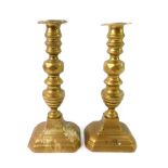 A pair of 19thC brass candlesticks, raised on canted rectangular bases, 25.5cm H.