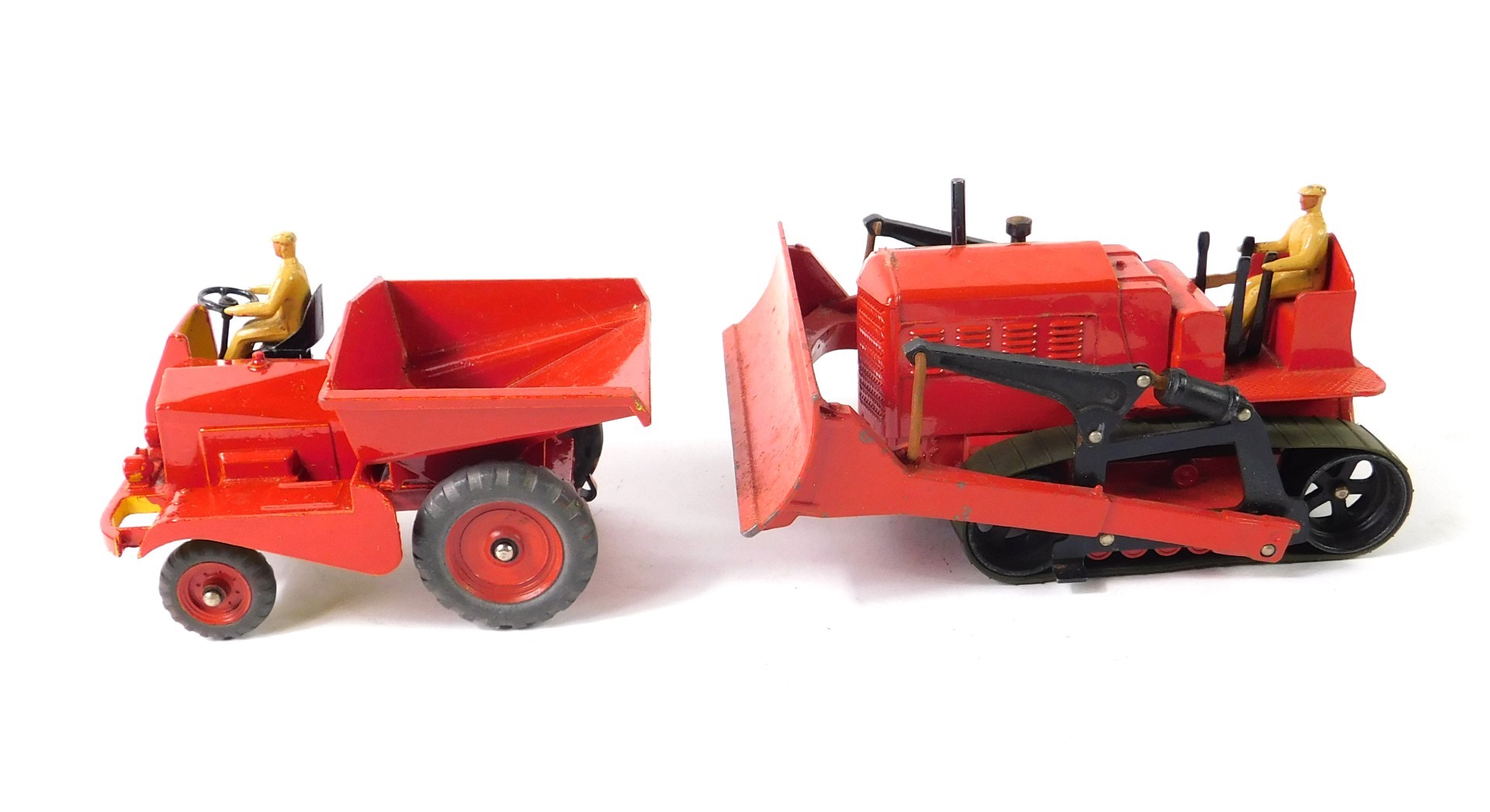 A Dinky Supertoys Blaw Knox bulldozer, red body with driver and crawler tracks, No 561, together