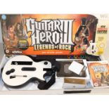 A Wii Guitar Hero III wireless guitar, Legends of Rock, with over seventy rocking songs, boxed.